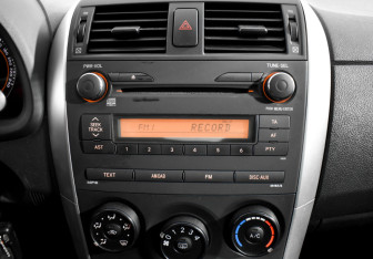 Подержанный автомобиль Toyota Corolla Sedan 2010 года (14 фото)