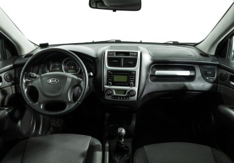 Подержанный автомобиль Kia Sportage 2010 года (13 фото)