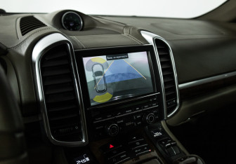 Подержанный автомобиль Porsche Cayenne 2010 года (15 фото)