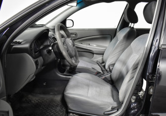 Подержанный автомобиль Nissan Almera Classic 2011 года (10 фото)