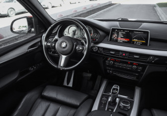 Подержанный автомобиль BMW X5 2016 года (13 фото)