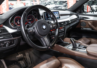 Подержанный автомобиль BMW X6 2017 года (16 фото)