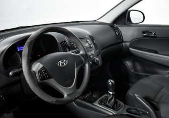 Подержанный автомобиль Hyundai i30 Hatchback 2011 года (9 фото)