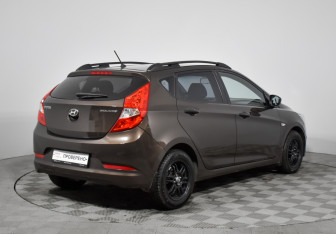 Подержанный автомобиль Hyundai Solaris Hatchback 2015 года (5 фото)