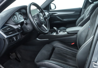 Подержанный автомобиль BMW X6 2019 года (13 фото)
