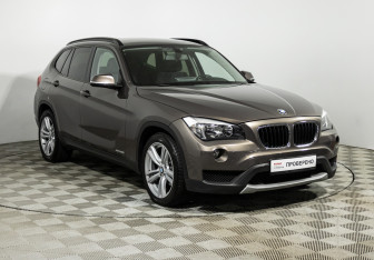 Подержанный автомобиль BMW X1 2013 года (3 фото)