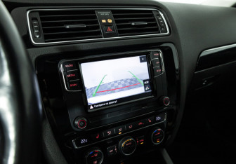 Подержанный автомобиль Volkswagen Jetta Sedan 2014 года (15 фото)