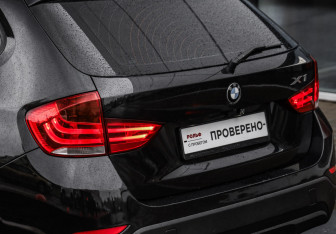 Подержанный автомобиль BMW X1 2013 года (12 фото)