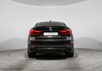 Подержанный автомобиль BMW X6 2015 года (6 фото)