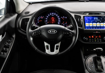 Подержанный автомобиль Kia Sportage 2011 года (11 фото)