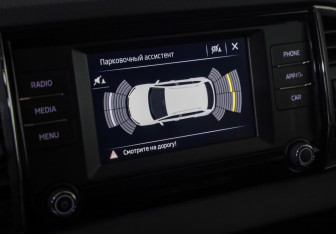 Подержанный автомобиль Skoda Karoq 2021 года (15 фото)