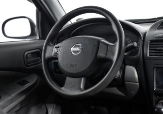 Подержанный автомобиль Nissan Almera Classic 2008 года (14 фото)