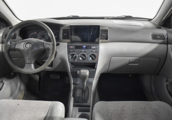 Подержанный автомобиль Toyota Corolla Sedan 2002 года (12 фото)