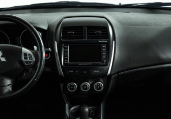 Подержанный автомобиль Mitsubishi ASX 2010 года (14 фото)