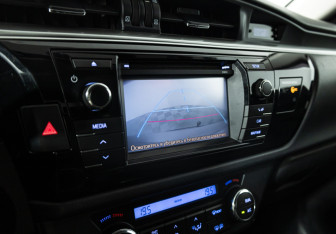 Подержанный автомобиль Toyota Corolla Sedan 2014 года (15 фото)